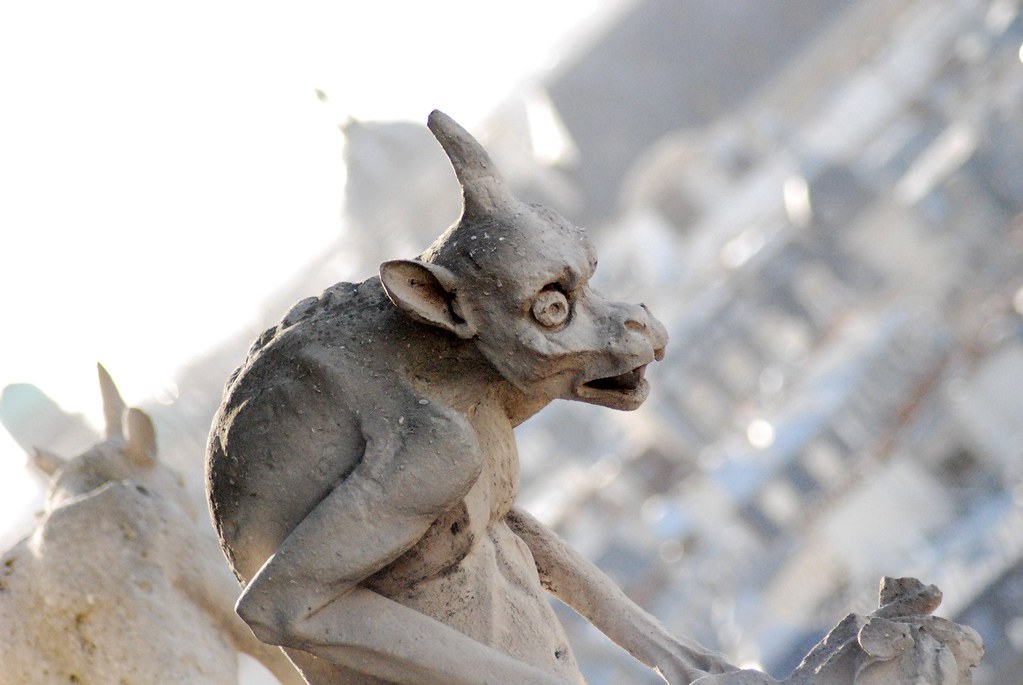 A shellshocked-looking gargoyle from Notre Dame cathedral