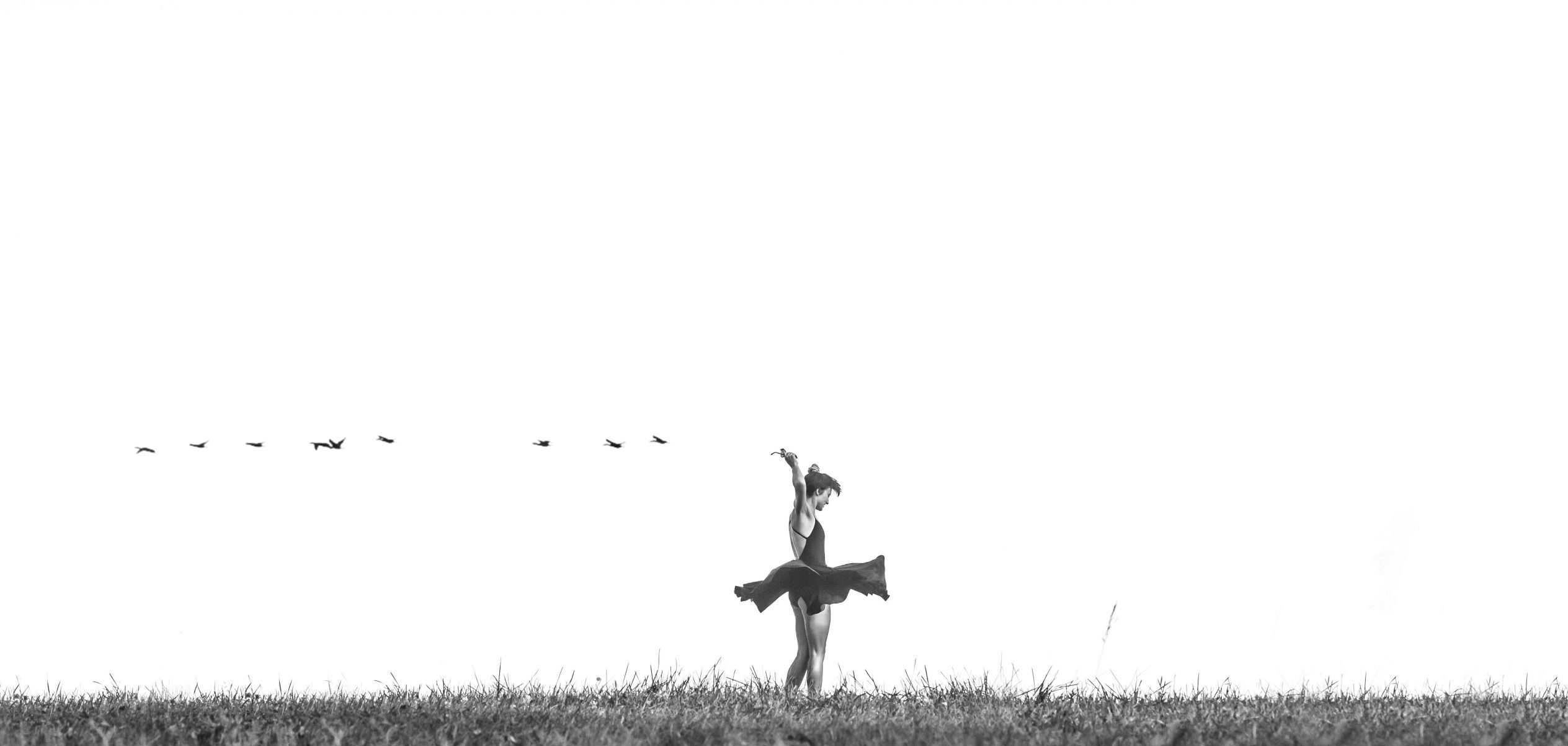 woman dancing in a field
