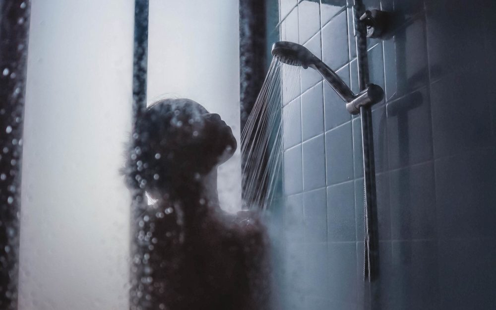 person in shower