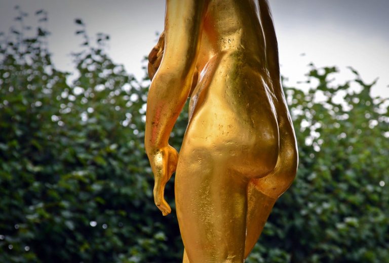 gold statue butt cropped