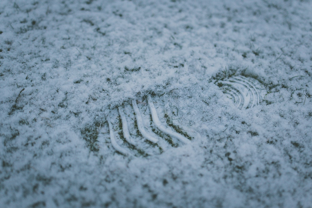 Image of a boot print in the snow