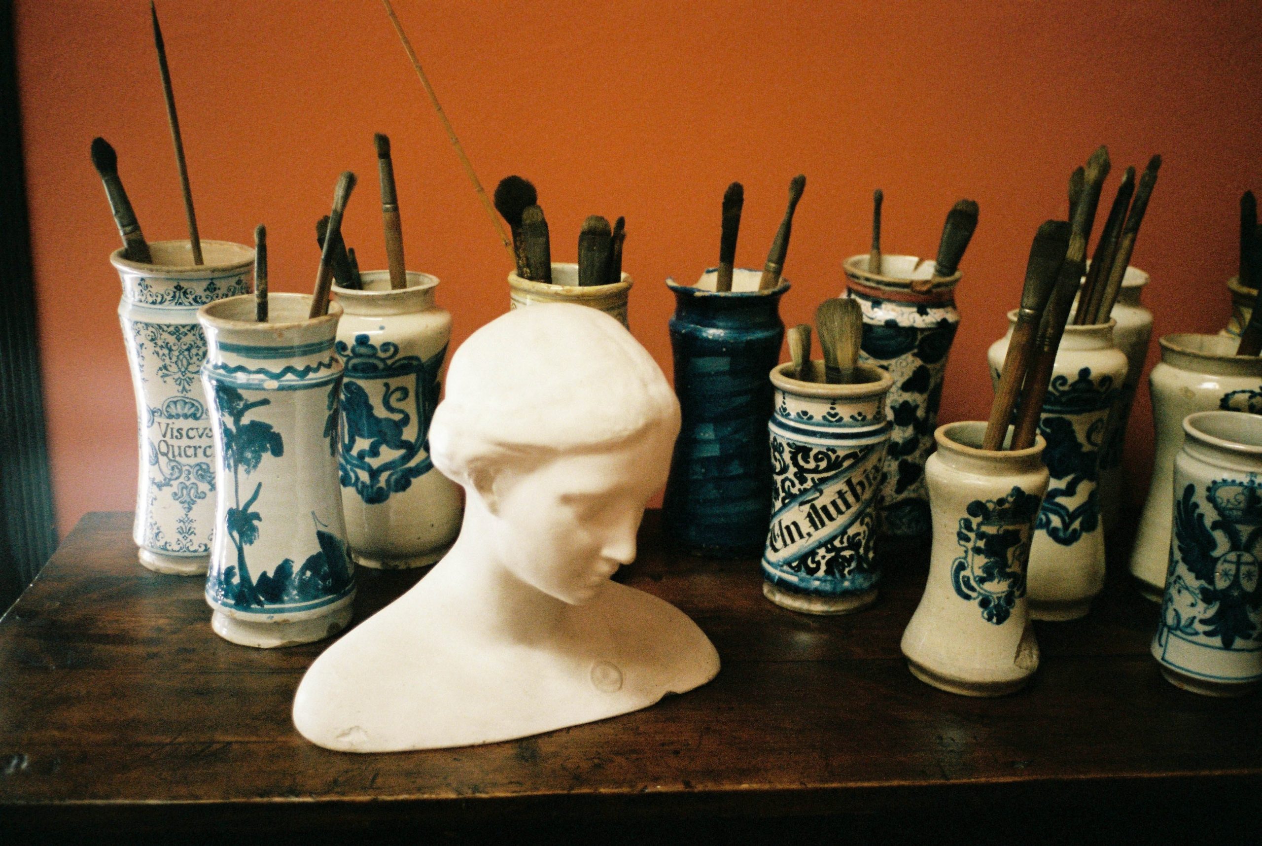 bust of a woman and paint brushes