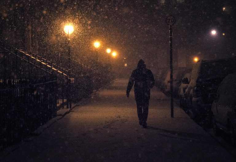 person walking in snow