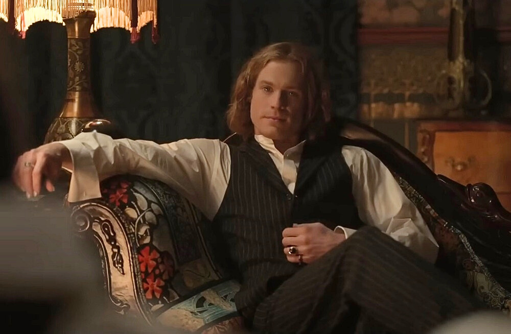 Lestat from "Interview with the Vampire" lounges on a chair