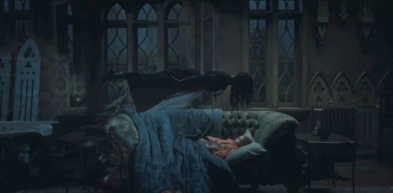 A ghost levitates over a child on a couch in a haunted house