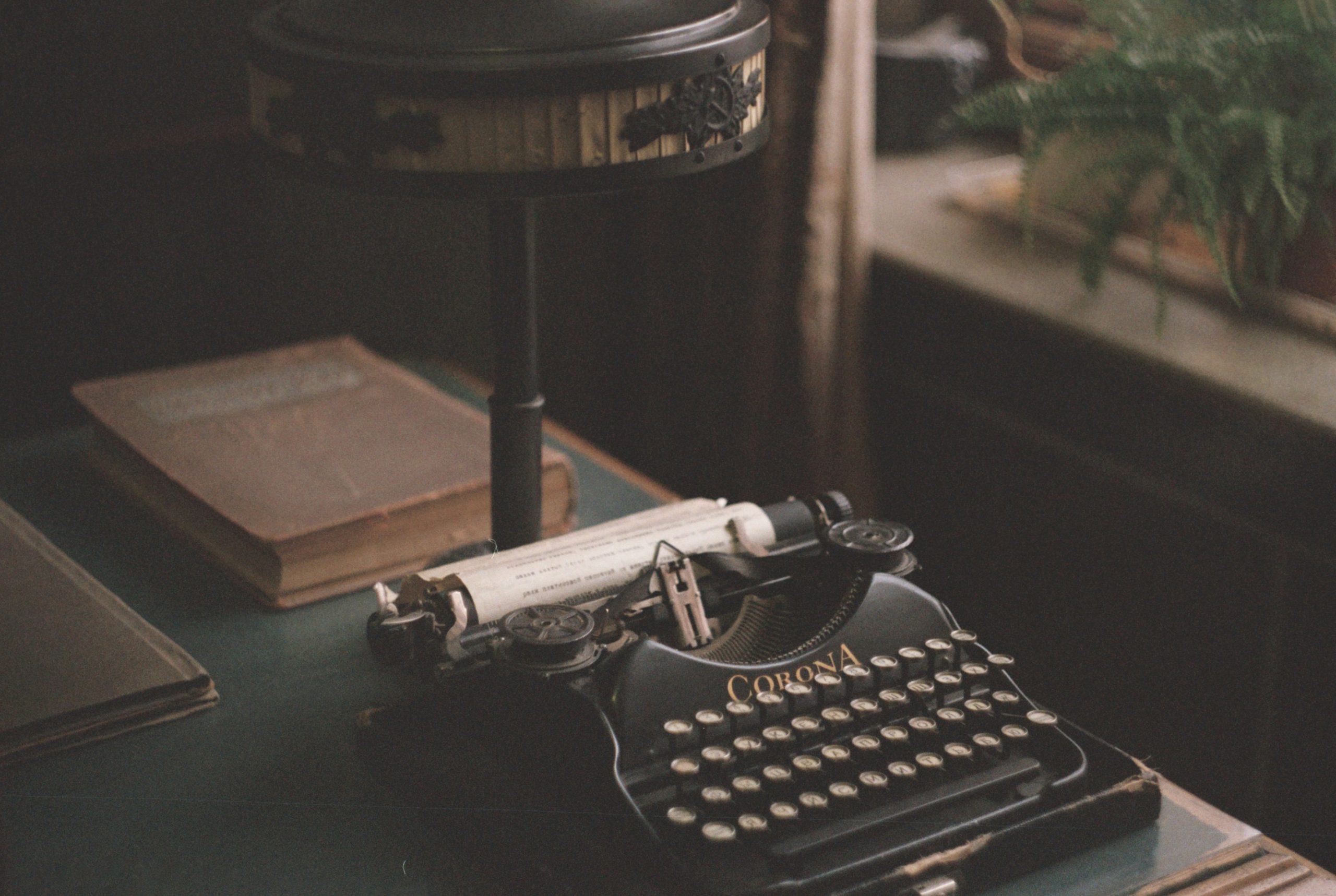 A typewriter sitting on a desk